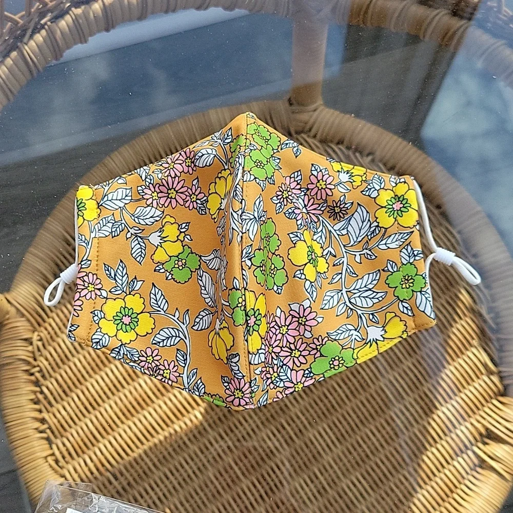 Tory Burch orange floral face mask